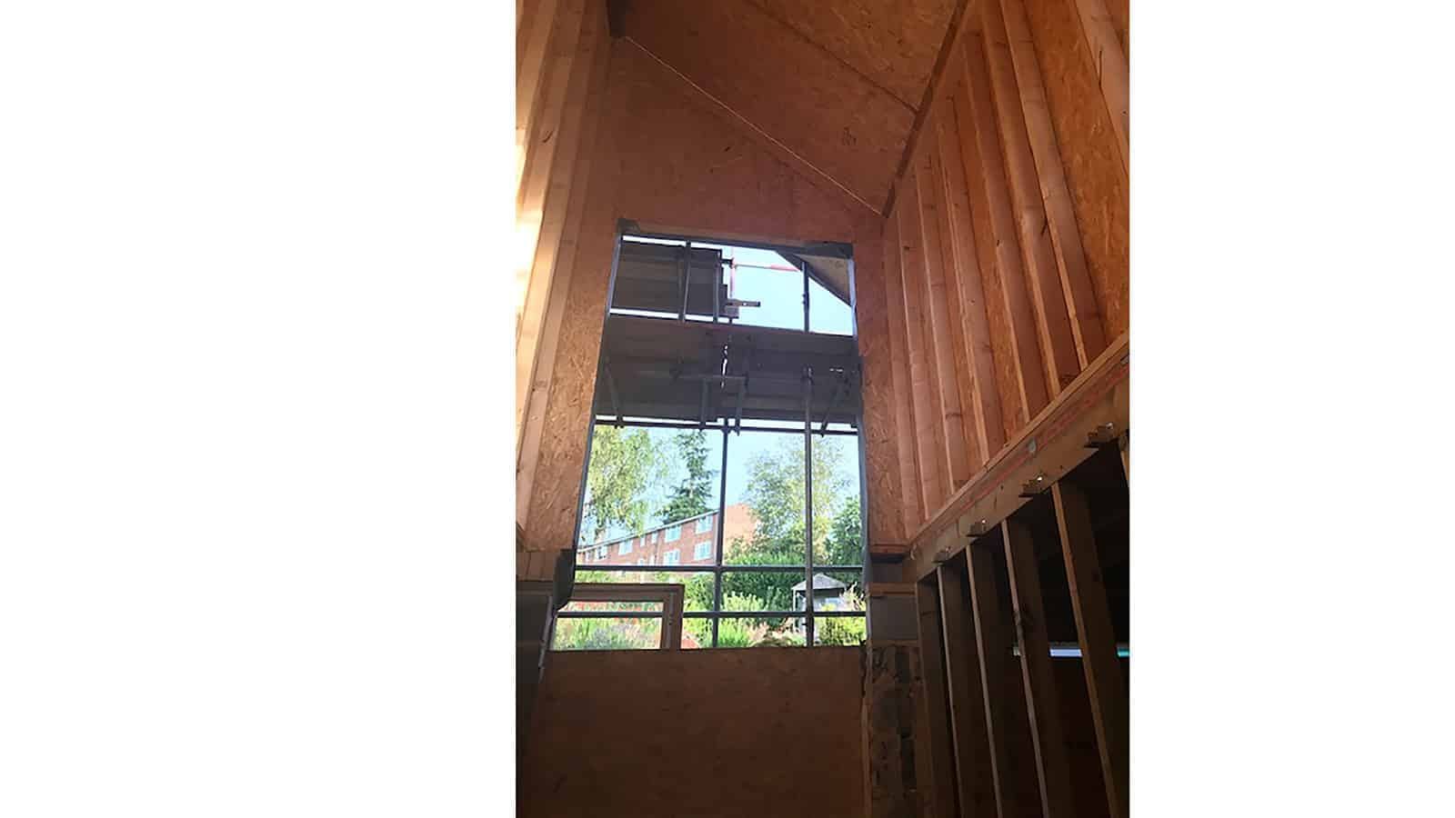 Work continues to transform a bungalow in Haslemere, Surrey, view 7